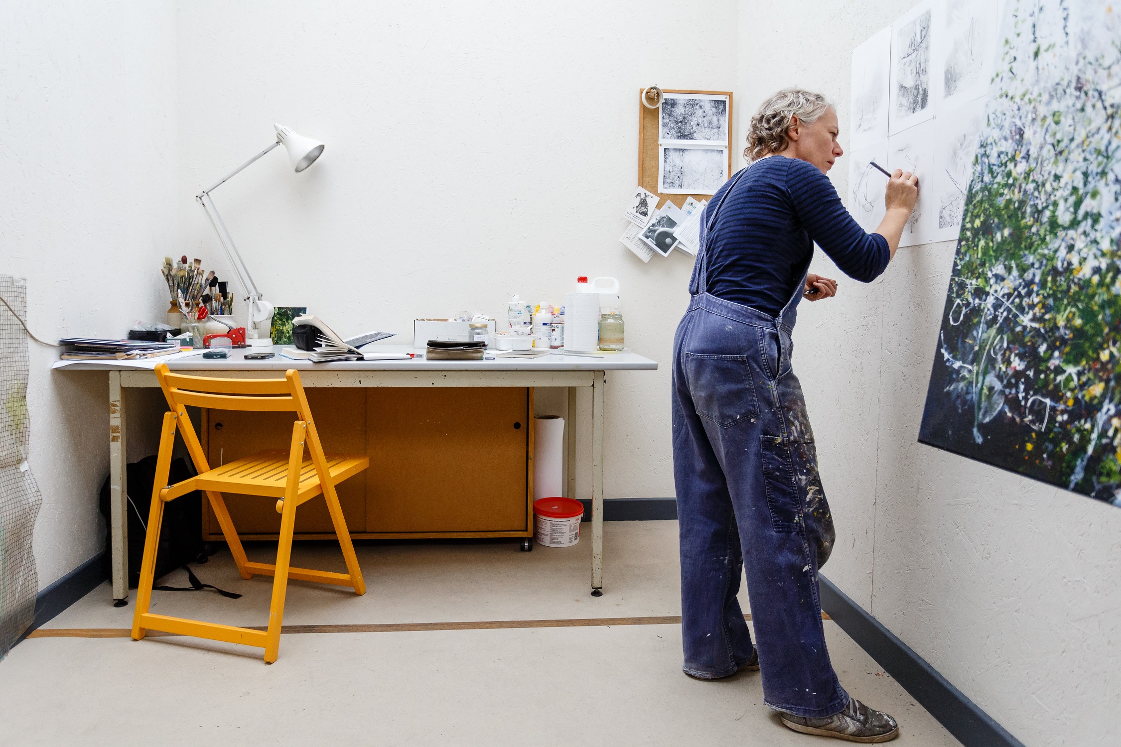 Artist Helen Thomas in her studio