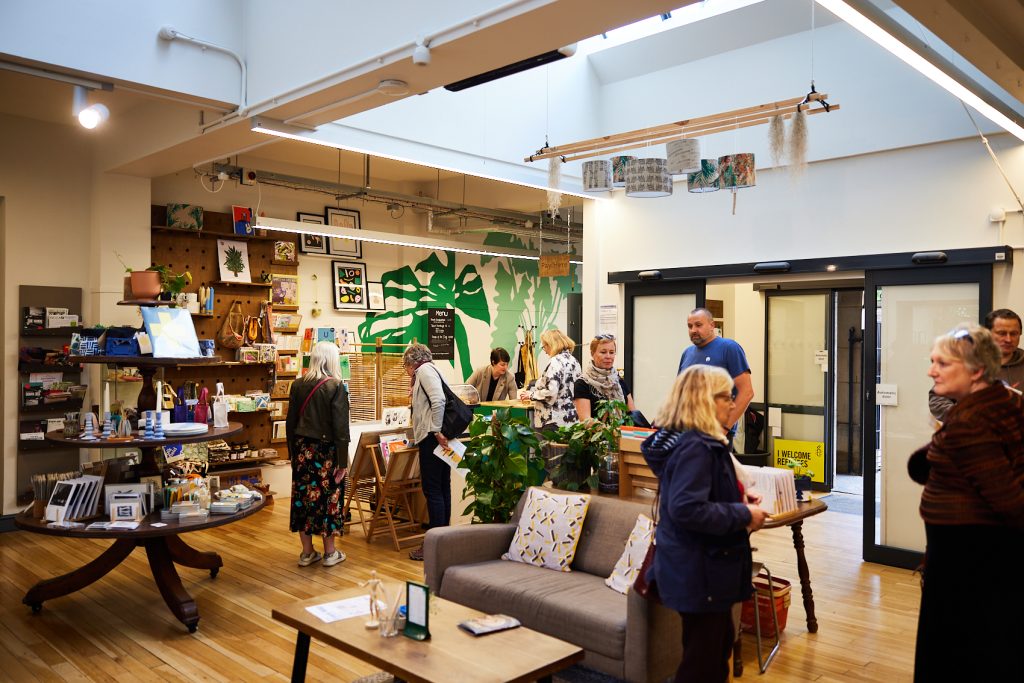 People shopping inside of The Art House.