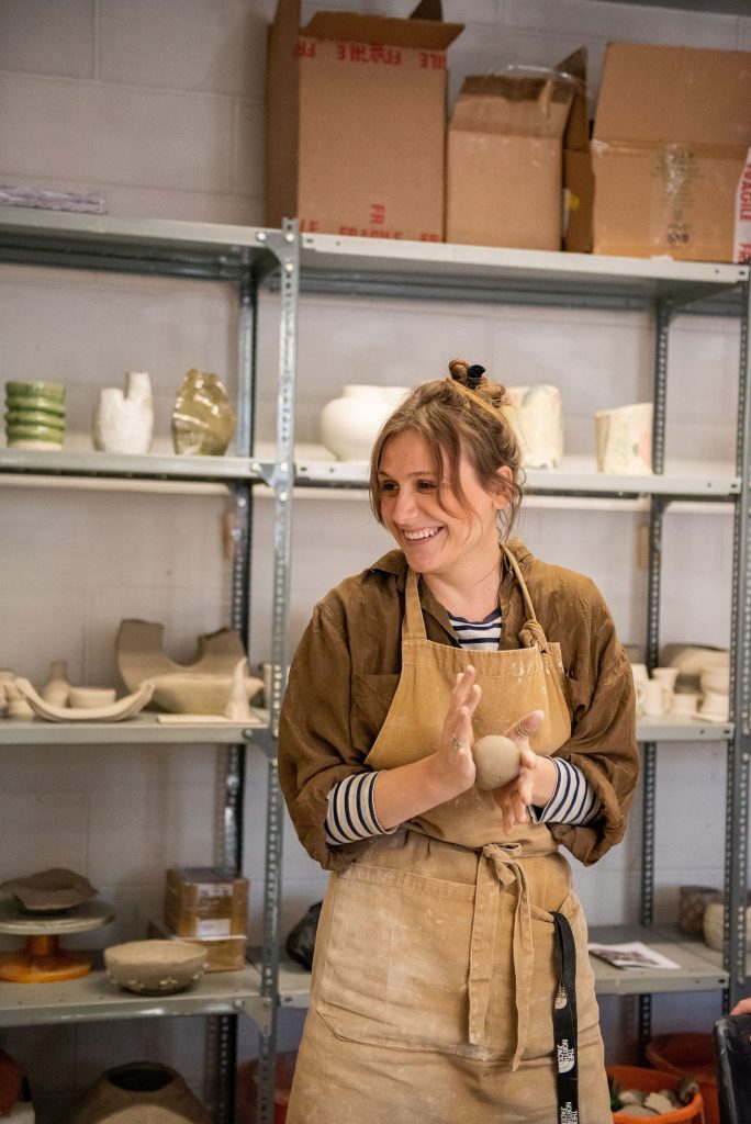 Our Ceramics Technician Hannah Way teaching a ceramics class.