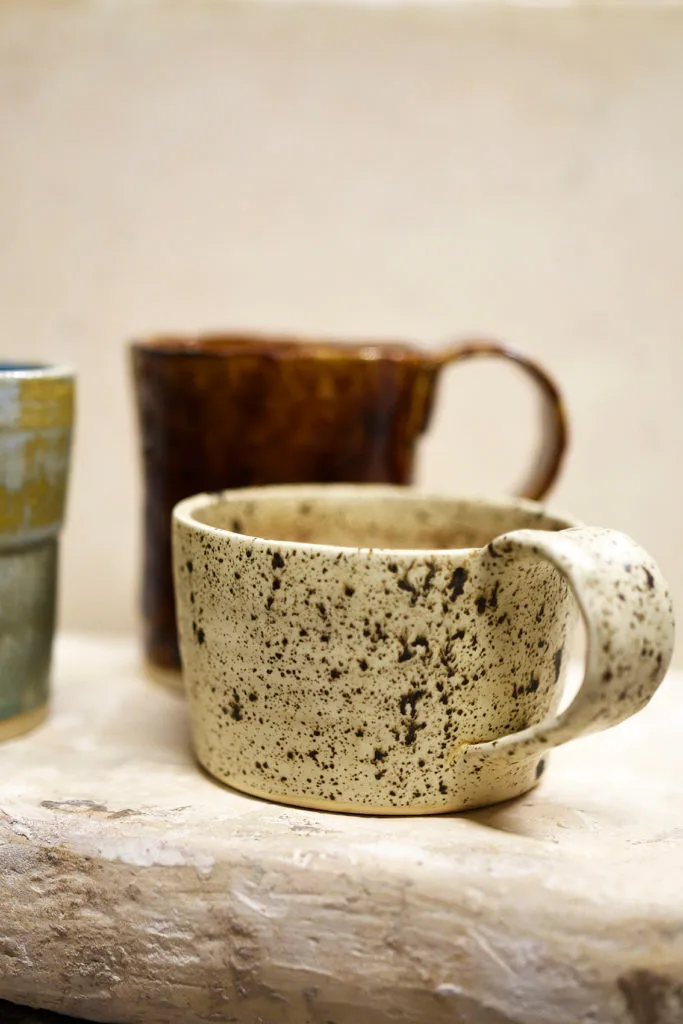 Three ceramic mugs