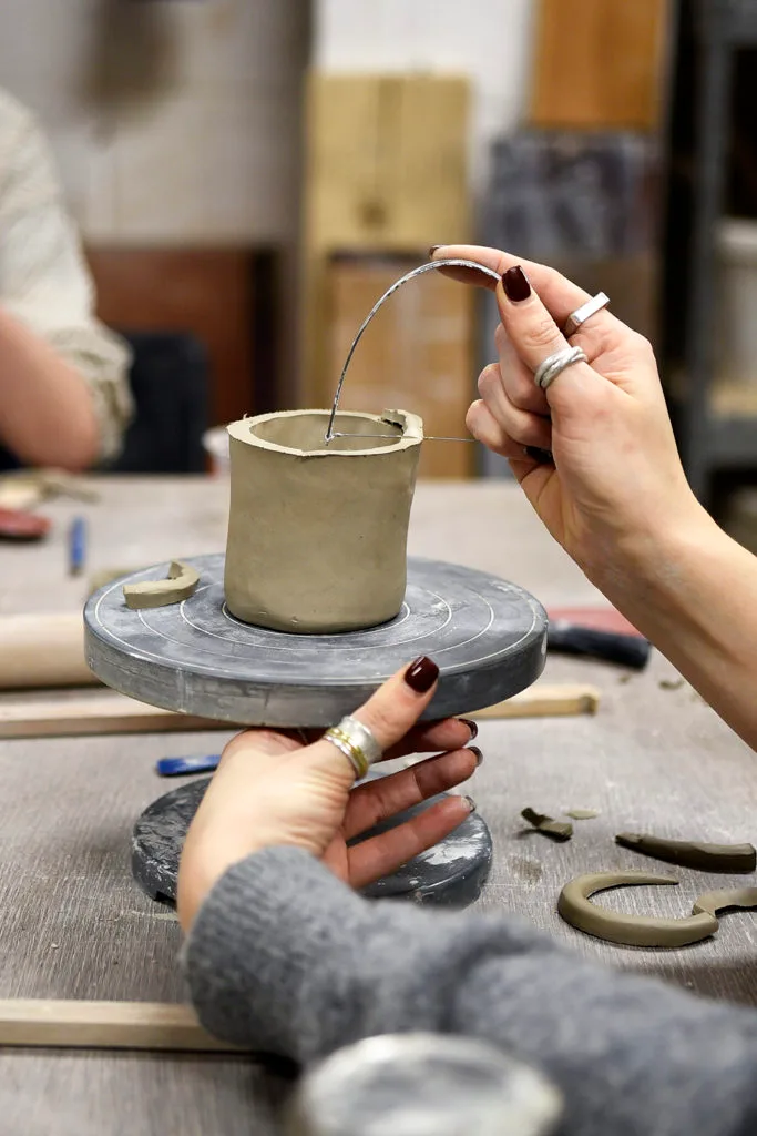A clay mug being shaped