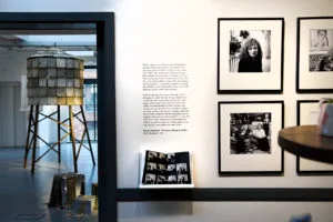 Framed black and white portraits by Emily Andersen displayed outside the gallery