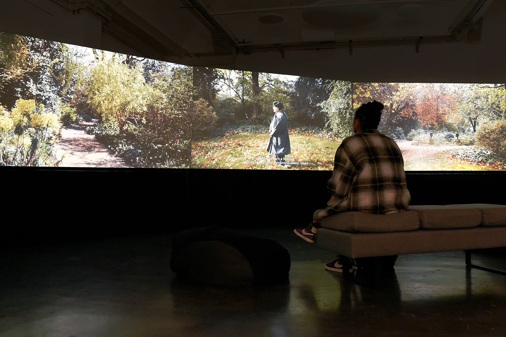 Emily Andersen: Somewhere Else Entirely Projector screen in darkened gallery