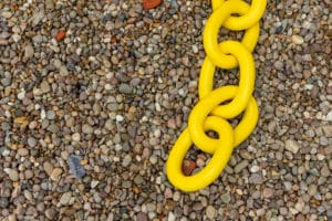 Detail of yellow chain from Personal Growth sculpture