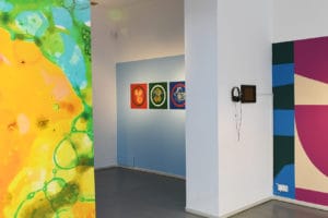 Wide view of gallery inside the Hospital Rooms Exhibition.